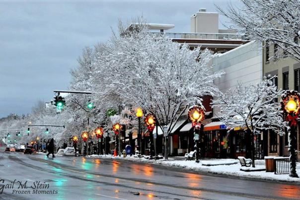 Snowy weather and holiday decorations on Broadway in downtown Saratoga Springs