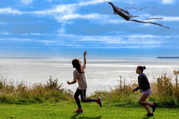 Children flying a kit along the Yorkshire Coast