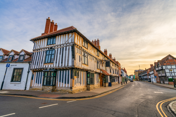 A wide angle street image of Stratford-upon-Avon showing Hotel Indigo