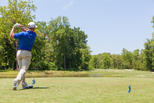 Man playing golf