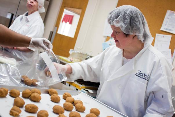 An image of cookie-making at Holy Angels