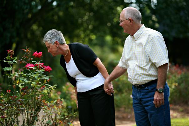 mature couple strolling the gardens at American Rose Center