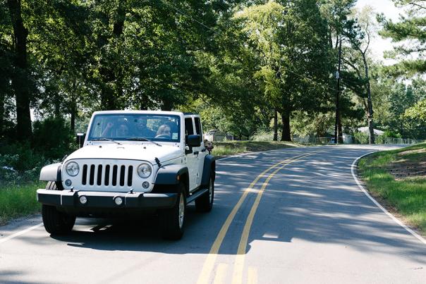 Friends in Jeep on Boom or Bust Byway in northwest Louisiana