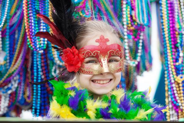 Girl Smiling on Mardi Gras Float