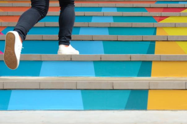 Person going up steps