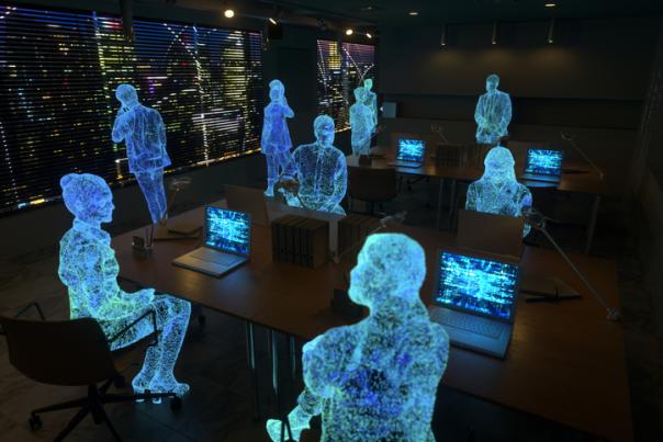 AI people at laptops