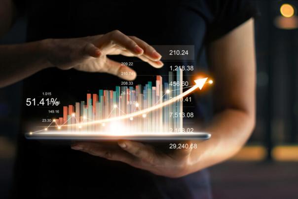 Person visually holding bar graph in hand