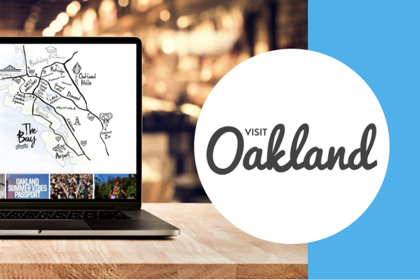 Visit Oakland + Simpleview Digital Services Case Study Header Image - Laptop with Visit Oakland website and their logo in a circle