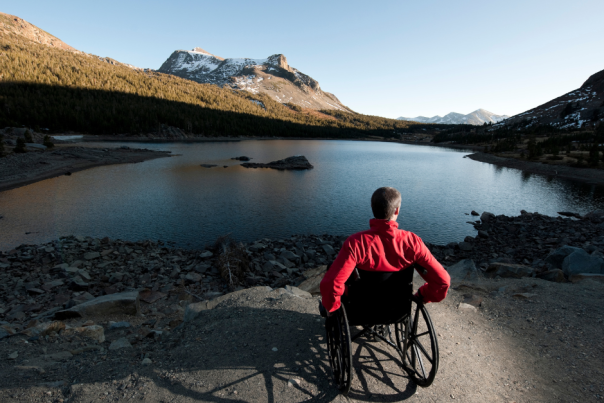 Solo Travel - Man in wheel chair at a lake - Accessible travel