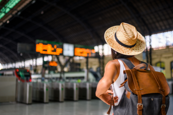 Solo Travel - Woman at train station terminal