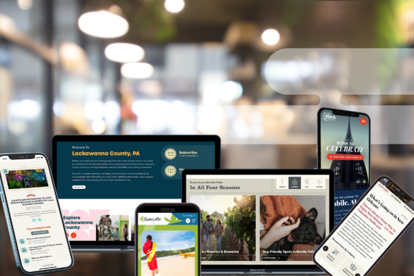 A variety of different destination marketing organization websites mocked up on laptops and phones.