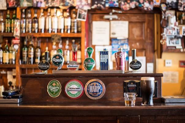 Beer taps on display at a bar in Ireland.