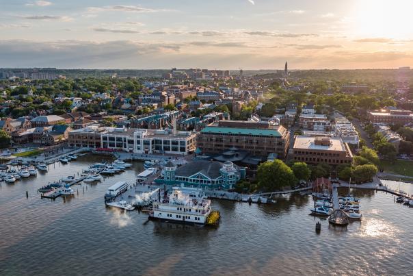 An aerial view of the sun setting behind Alexandria, VA.