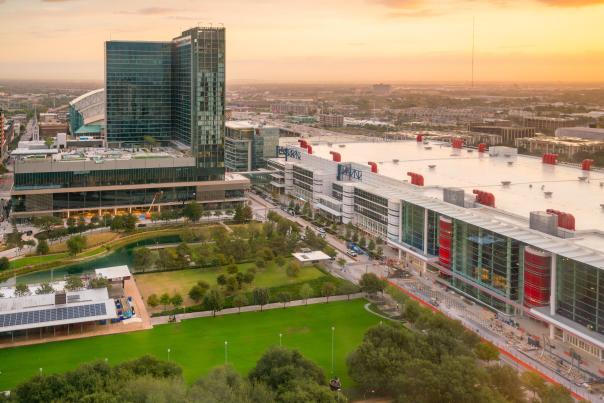 A large convention center integrated into the surrounding cityscape, illustrating how modern venues function as destinations within the broader urban experience.