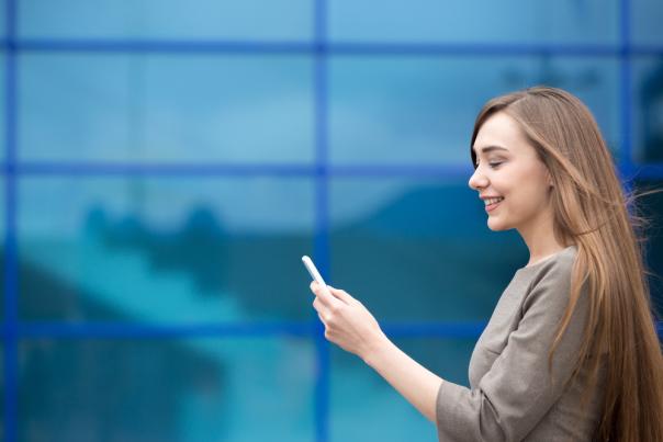 EF Woman on phone shutterstock_428237980
