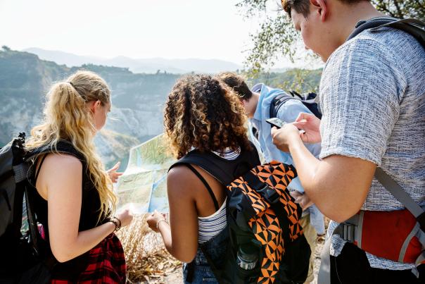 travelers looking at map