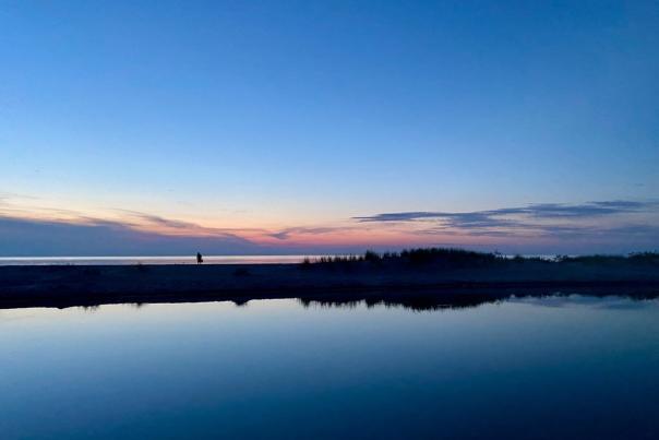 Sunset over Lake Michigan at the end of the Platte River