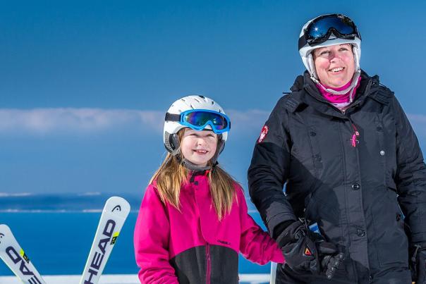 Mother & Daughter in ski gear