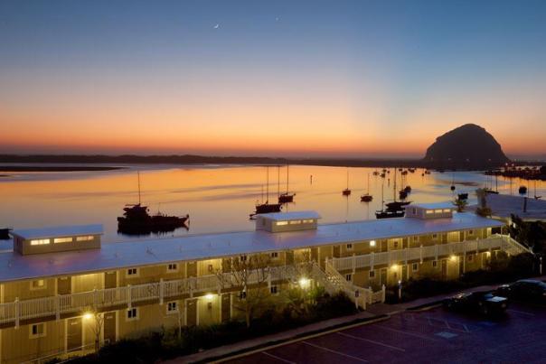Inn at Morro Bay external view with Morro Bay harbor in backround