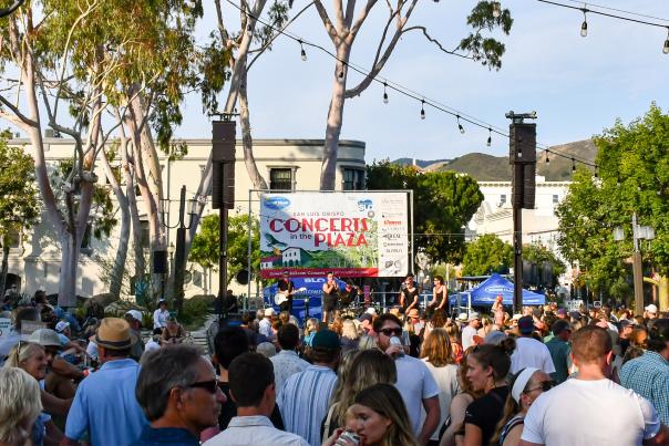 Crowd listening to music outdoors