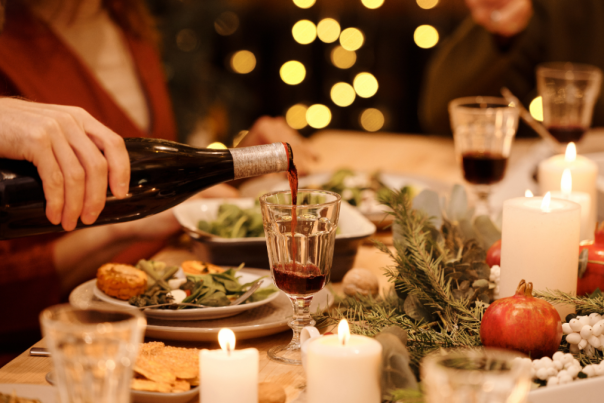 Wine being poured at a holiday dinner