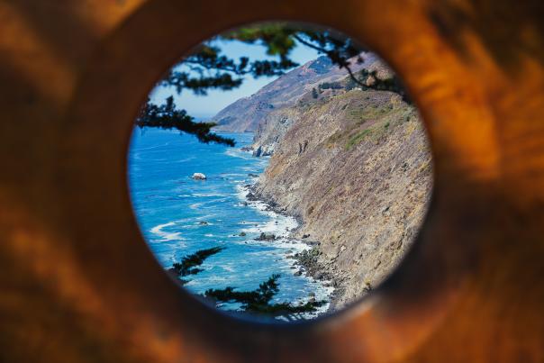 Looking through 'Million Dollar View' sculpture to big sur coastline at Ragged Point