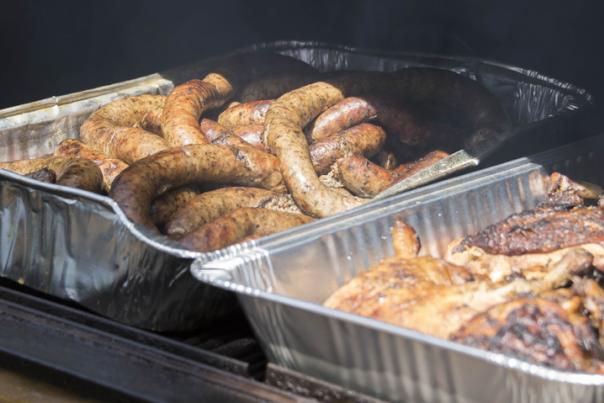 Polish sausages and grilled meats in catering trays