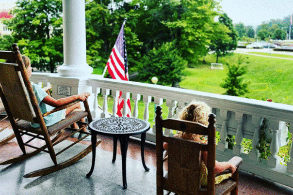 French Lick Springs Hotel porch with children in rockers