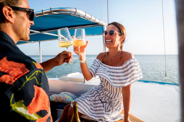 Couple cheering on a boat