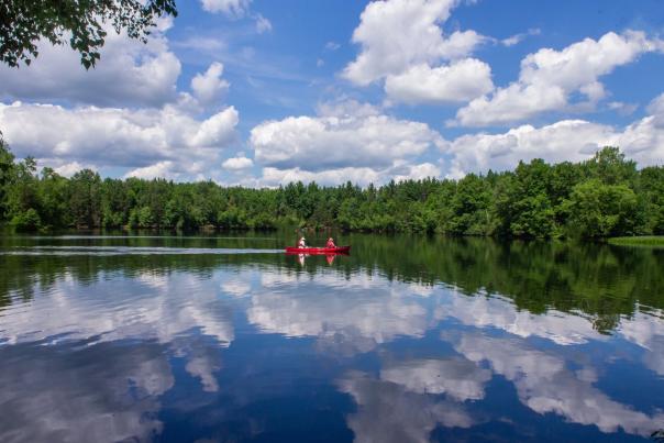 kayaking on the lake during the summer
