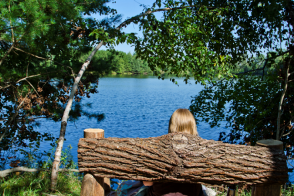 Girl Sitting By Lake Joanis in Schmeeckle.