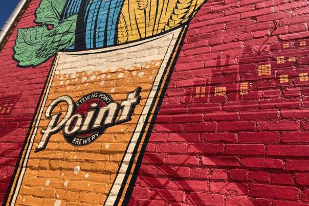 Enjoy the interactive #GrabTheGlass mural in Downtown Stevens Point, celebrating the 160th anniversary of the Stevens Point Brewery!