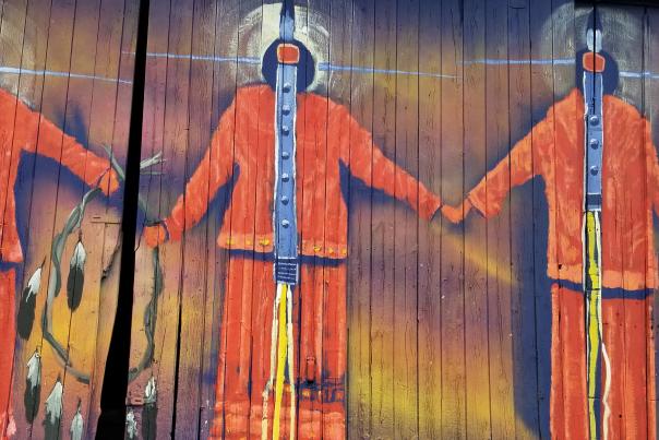 Get to know the artist behind "A Song for Seven Sisters" mural, Chris Sweet.