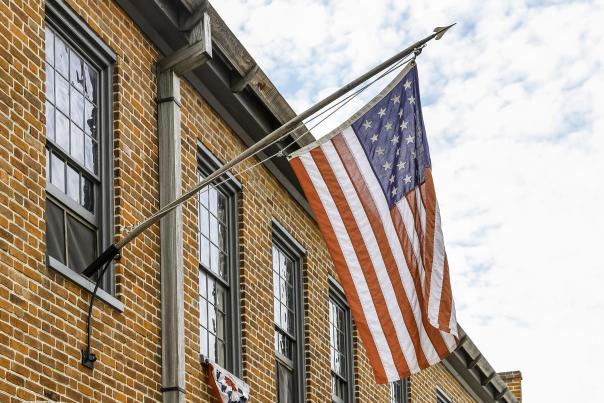An American Flag hanging outside the First Missouri State Capitol.