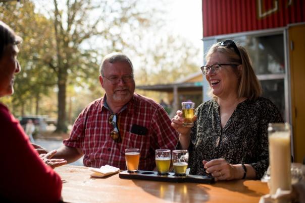 Patrons enjoy a flight of beers at Bayou Teche Brewing in Arnaudville, LA on November 29, 2019.