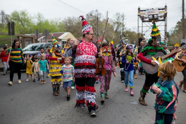 Brazos Huval, Cajun musician and music teacher, leads Teche Center for the Arts’ Courir de Infantes in downtown Breaux Bridge in February.