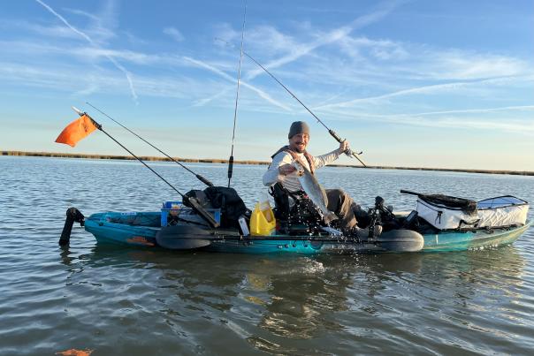 Forrest Green fishes for Speckled Trout in Lake Pontchartrain.