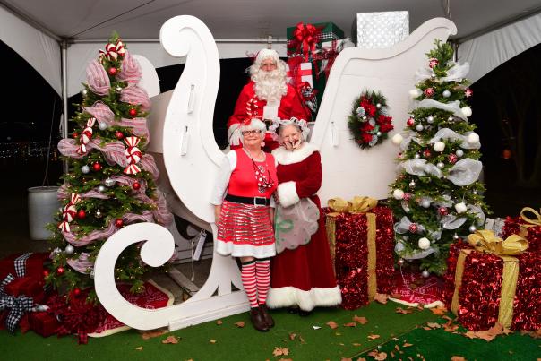 Santa and Mrs. Claus and an elf at Slidell's Bayou Christmas