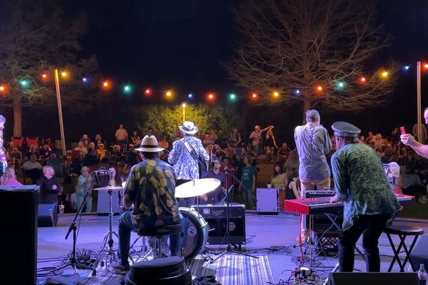 View from behind the stage at a Mandeville Live! Free Friday concert at Mandeville Trailhead.