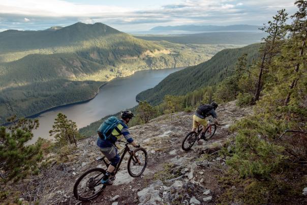 Mountain bikers ride a trail on Mt. Mahony that overlooks Haslam Lake.