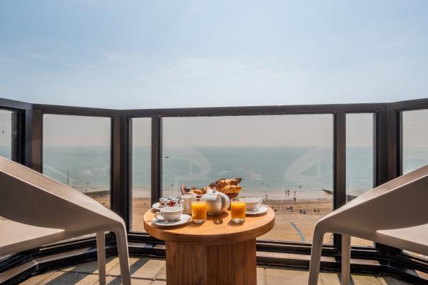 A view of Eastbourne beach and the sea from the hotel balcony at The View Hotel