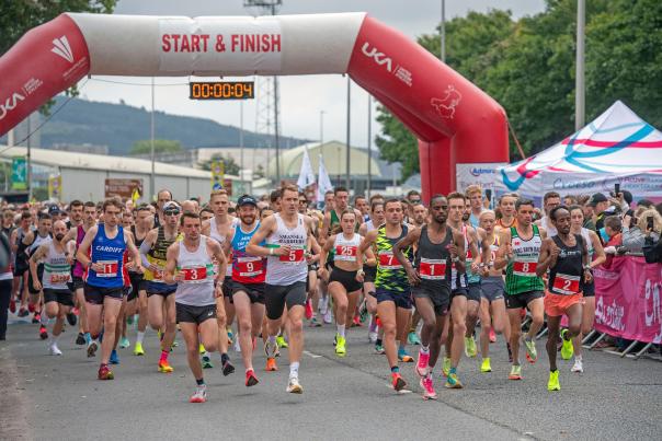 Entrants running off the starting line at the Swansea Bay 10k