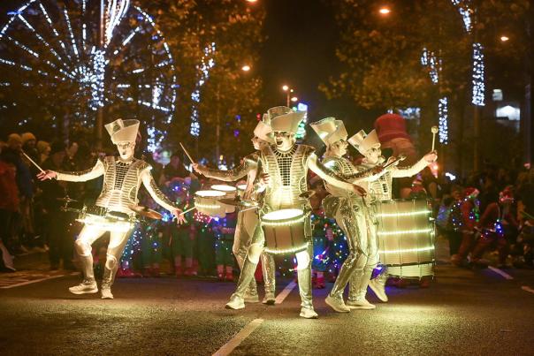 Light up drummers and fairies at the Christmas parade.