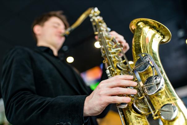 A man playing a saxophone.