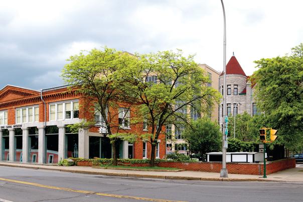 Panorama of Blue Skies and Green Trees Featuring Weighlock Building