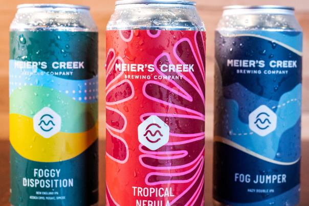 Three flavors of Meier's Creek Beer in cans