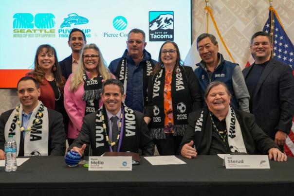 A group of leaders from Puyallup Tribe of Indians, Pierce County, and City of Tacoma pose for a photo at Puyallup Tribe of Indians FIFA World Cup MOU signing at Tribal Administration Building