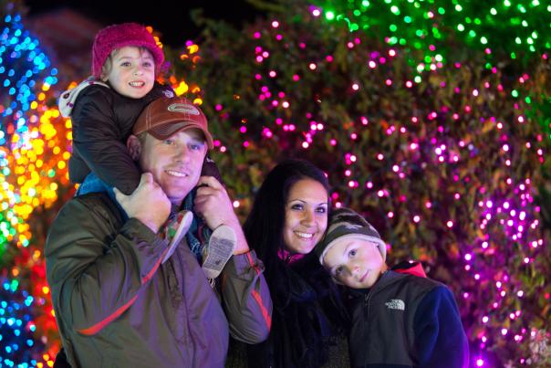 Mother, Father and two sons enjoy Zoolights at Point Defiance Zoo