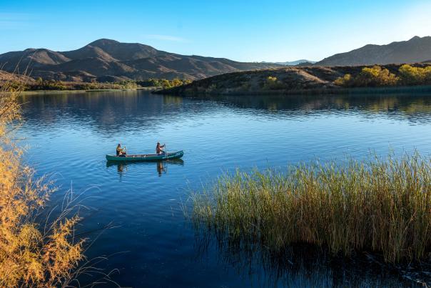 Friends at Lake Skinner in Temecula in a canoe