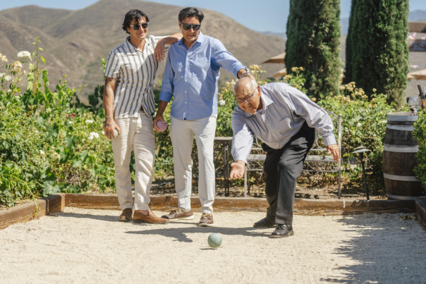 Father and Son Playing Bocce Ball at Winery